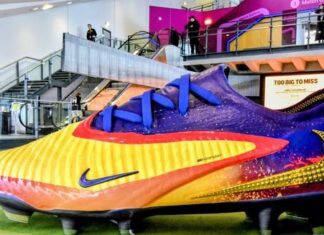 A giant Nike Erling Haaland replica football boot is on display in Manchester