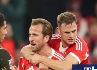 European football: Bayern extend perfect start with Kane goal in Dortmund win