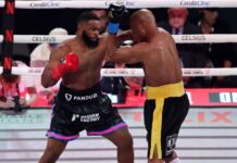 Anderson Silva nocauteia Woodley e vence confronto de ex-campeões do UFC no boxe