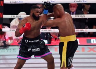 Anderson Silva nocauteia Woodley e vence confronto de ex-campeões do UFC no boxe